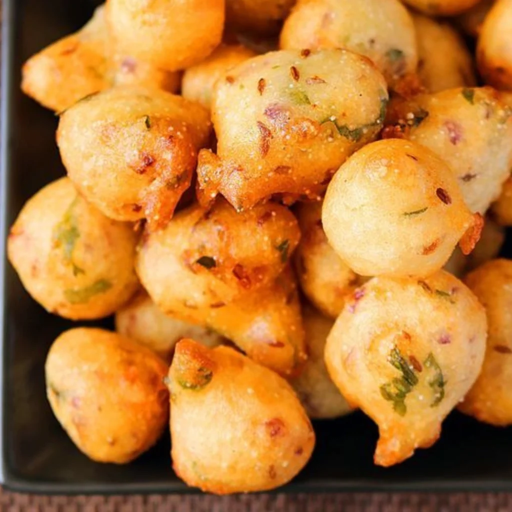 "Homemade crispy masala boondi, traditional Indian fried chickpea flour balls with spices and herbs"