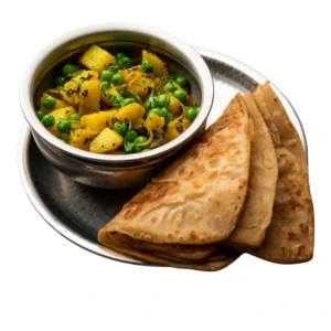 "Aloo matar curry with roti - Indian potato and green peas curry served with homemade flatbread"